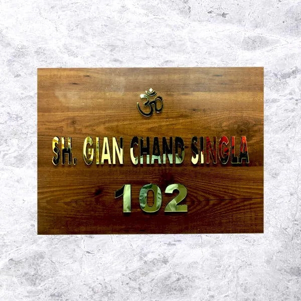 wooden and golden name plate